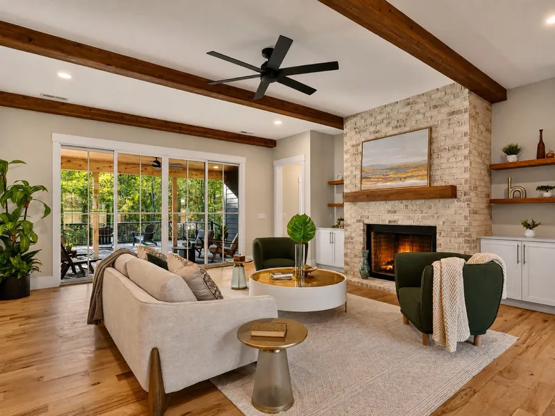 Great room with beamed ceiling and brick fireplace