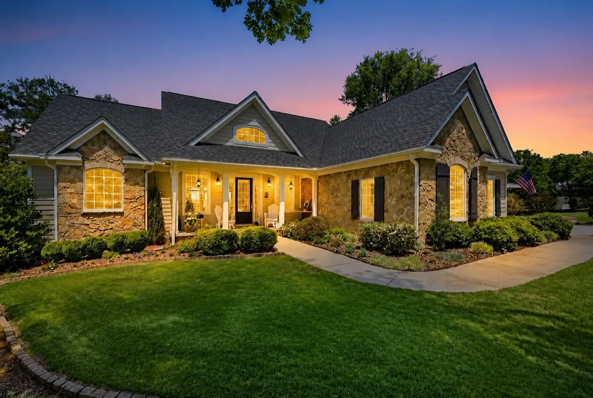 Stone and siding home at twilight in Ninety Six, South Carolina, purchased with Geoff Bey as the buyer's agent